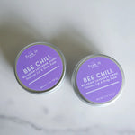 Load image into Gallery viewer, Two tins of True It Naturals Bee Chill Beeswax Lip Balm on a white background
