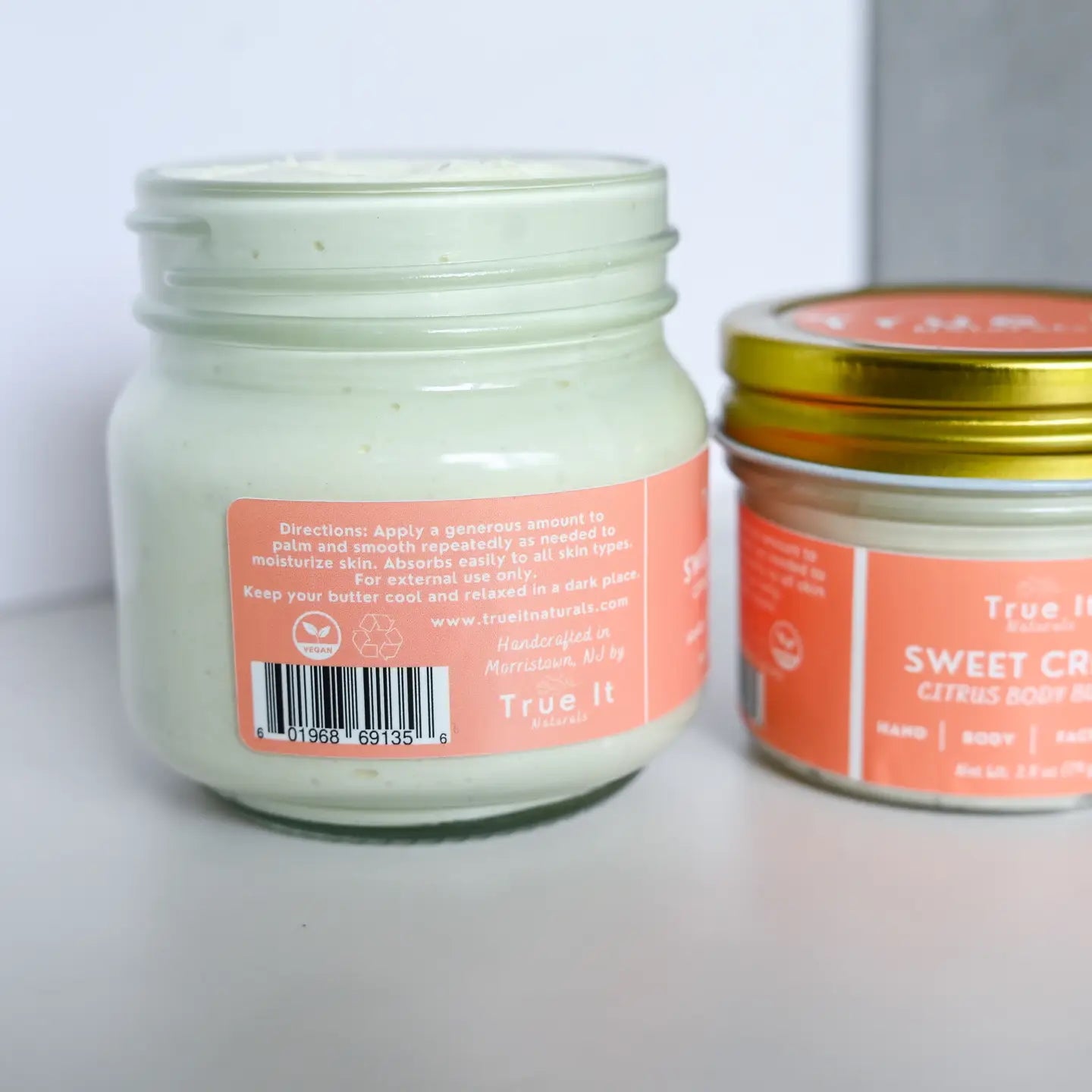 Jars of Citrus Cream body butter showing the directions