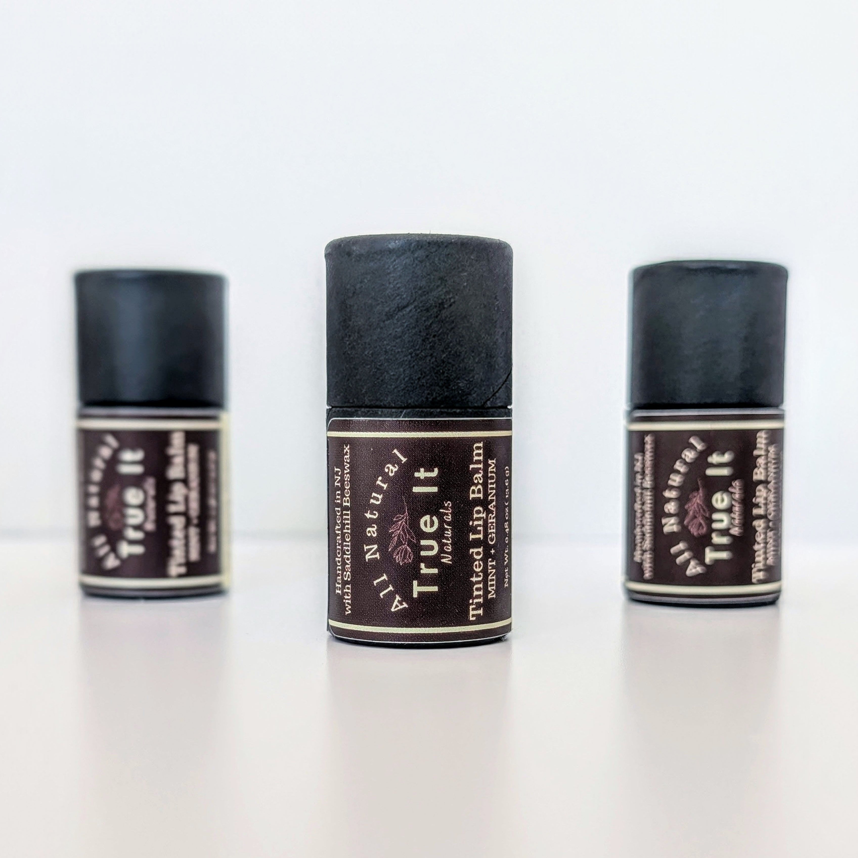 Three of the True It Naturals Tinted Lip Balms