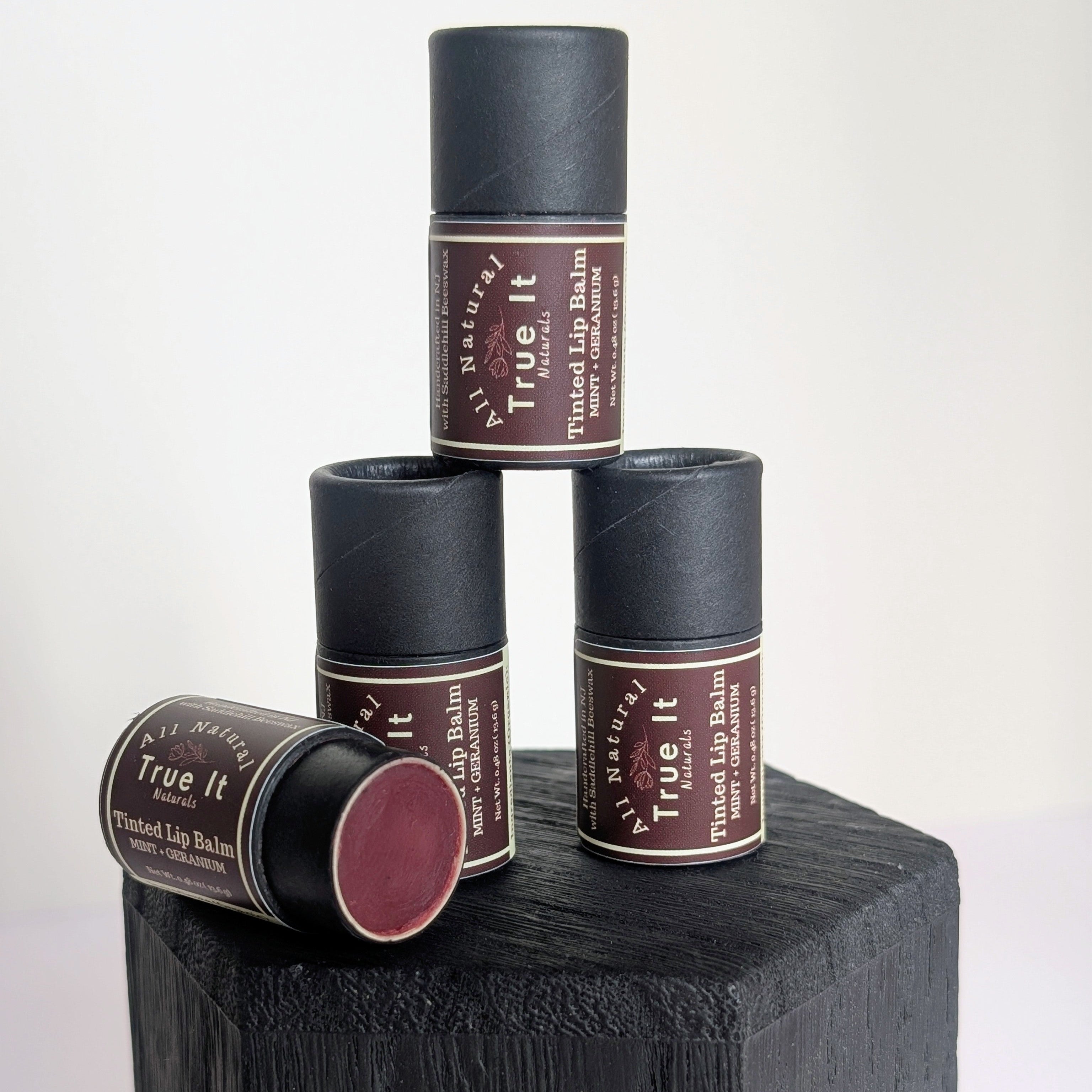 True It Naturals Tinted Lip Balm stacked and showing the natural tint.