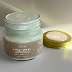 Load image into Gallery viewer, Large True It Naturals Sweet Cream whipped body butter with the lid off showing the cream texture.
